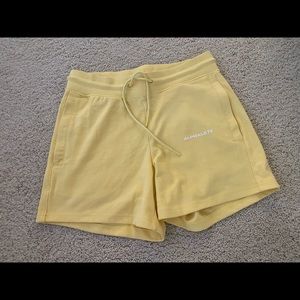 Alphalete yellow sweat shorts